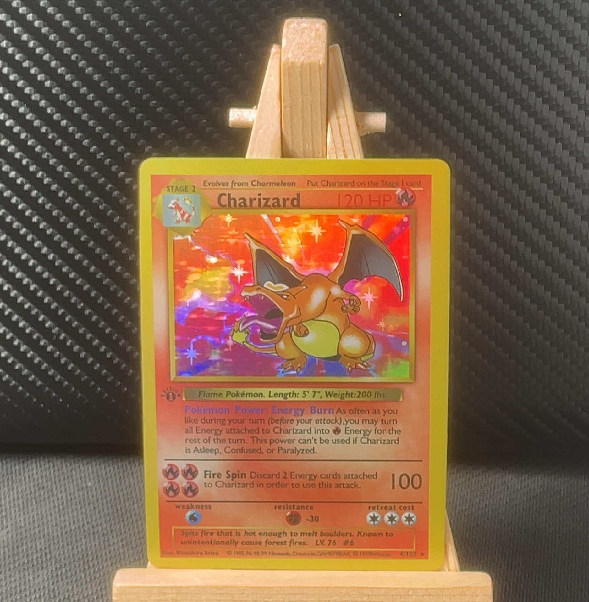 Foil detail of Charizard — Base Set 4/102