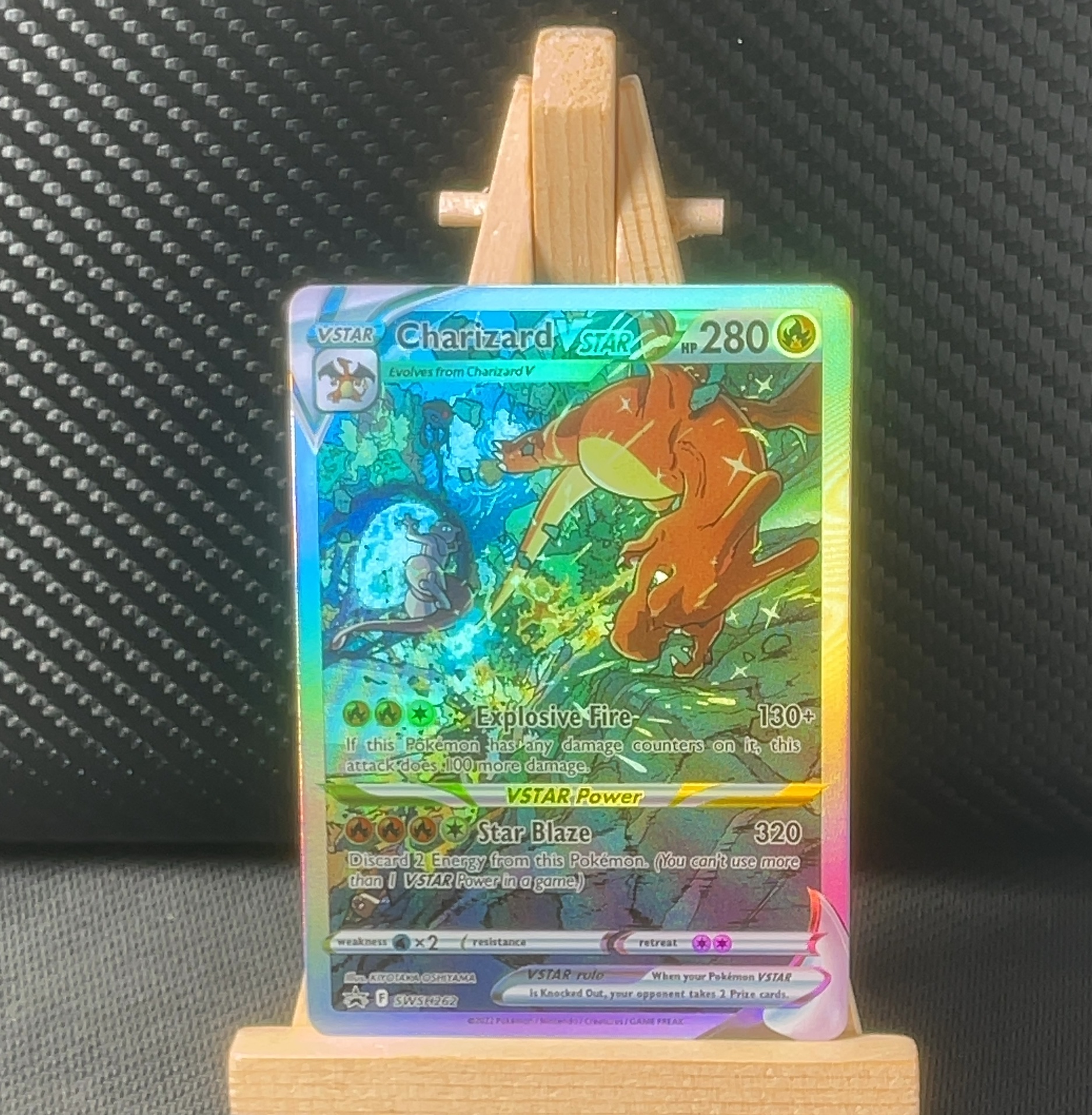 Foil detail of Charizard VSTAR — SWSH Black Star Promos SWSH262