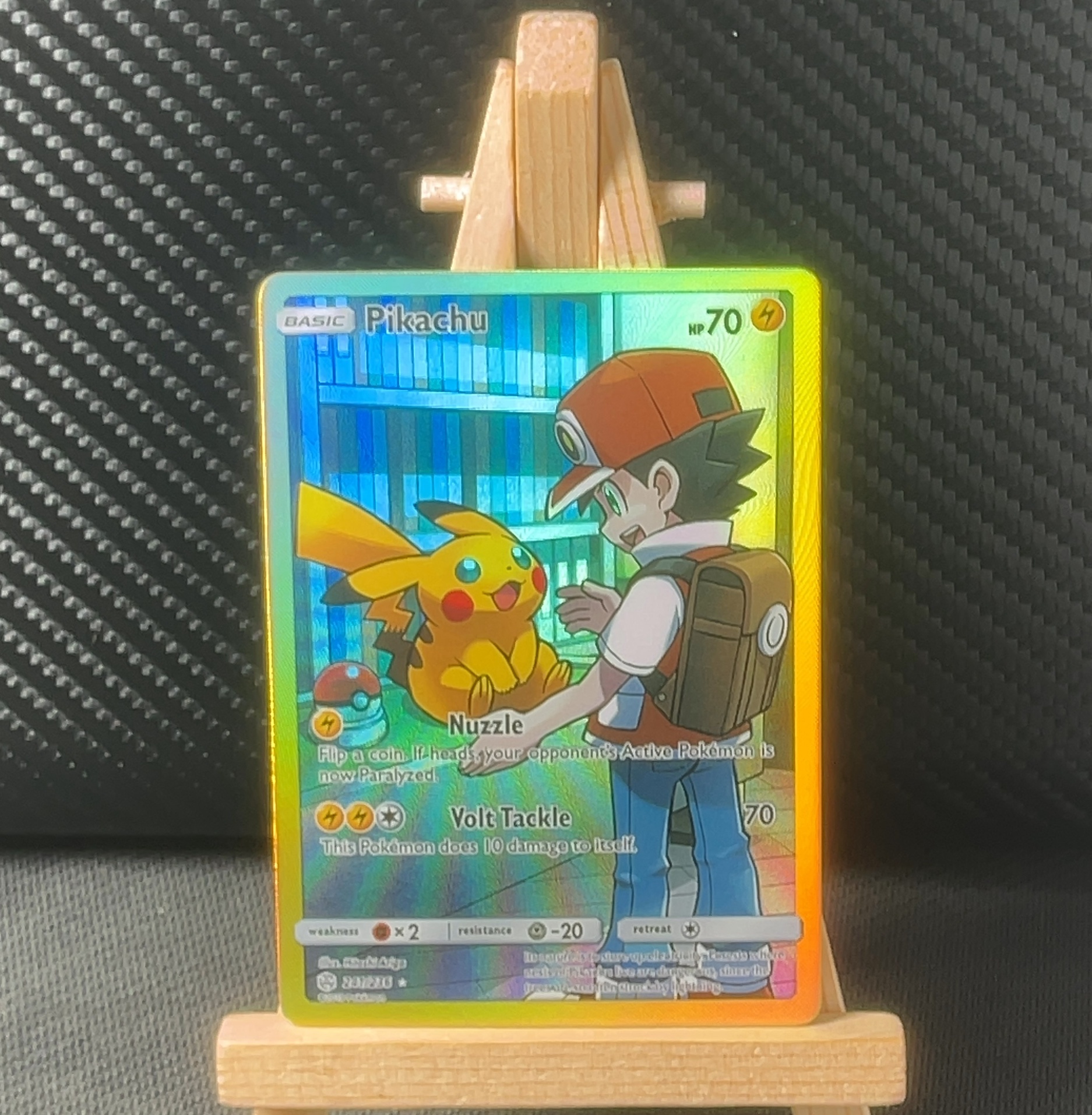Foil detail of Pikachu — Cosmic Eclipse 241/236